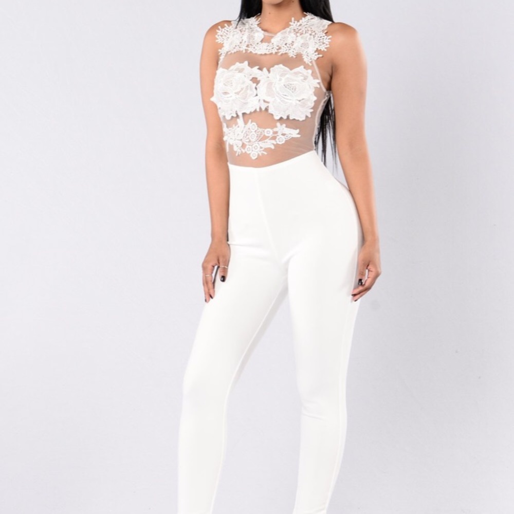 White jumpsuit with lace detailing